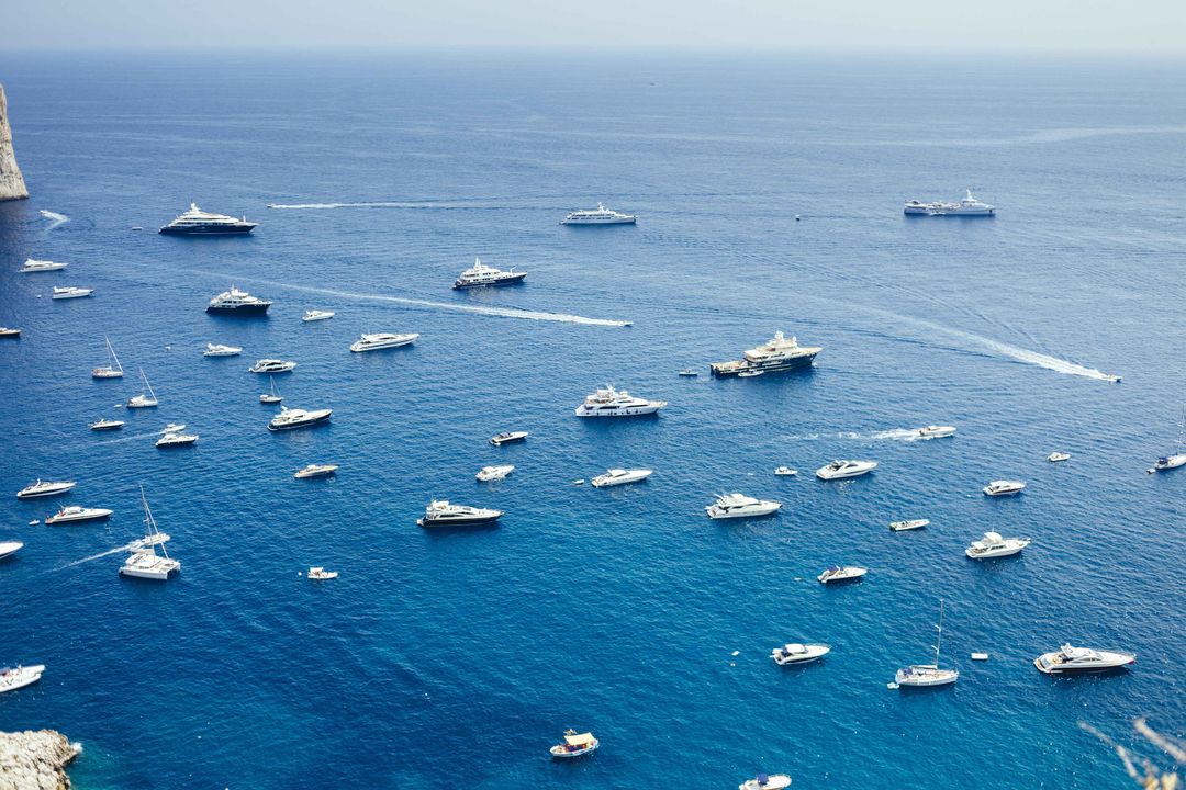 67c042bb36584f8f437f672b luxury yachts and boats dotting the serene blue se 2024 07 08 20 50 11 utc20(1) p 1080